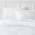 Twin/Twin Extra Long Microfiber Micro Texture Comforter White - Room Essentials